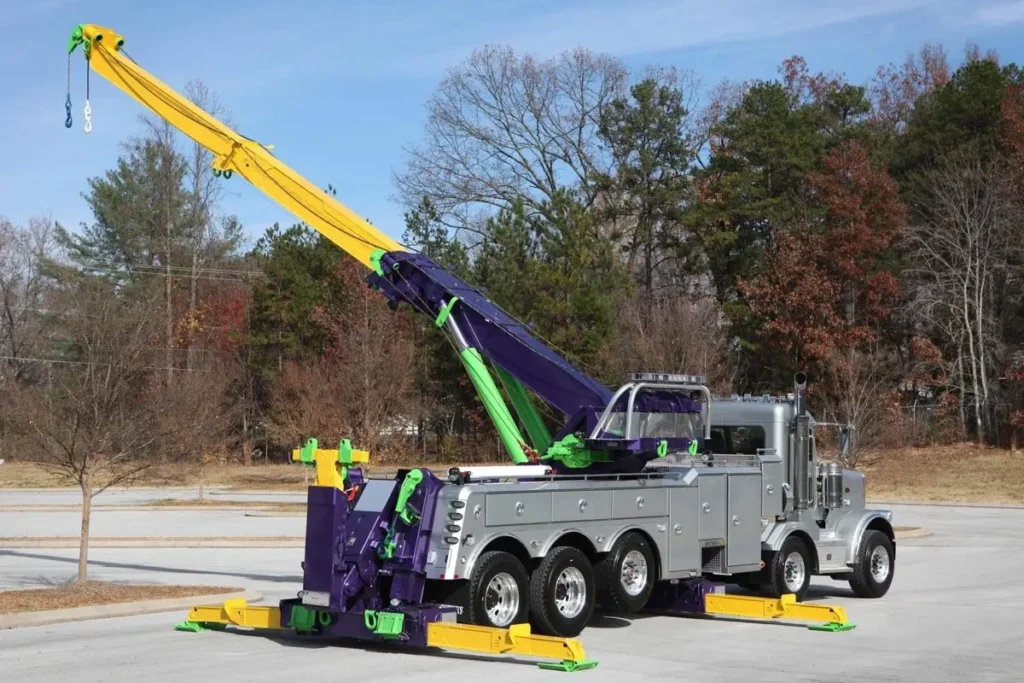 Comparison of six tow truck types in 2025, including flatbed, wheel-lift, integrated, rotator, hook and chain, and boom tow trucks, showcasing their unique features for vehicle towing and recovery.