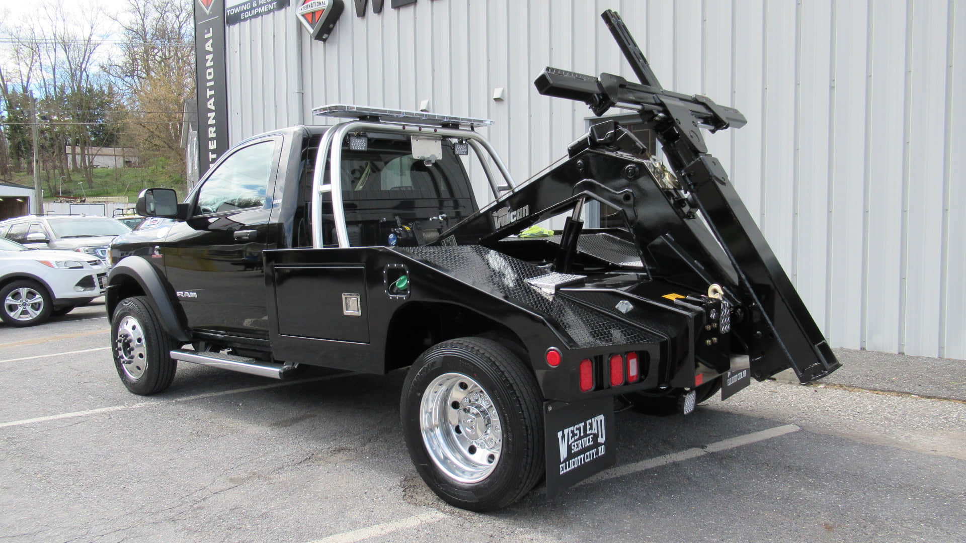 Comparison of six tow truck types in 2025, including flatbed, wheel-lift, integrated, rotator, hook and chain, and boom tow trucks, showcasing their unique features for vehicle towing and recovery.